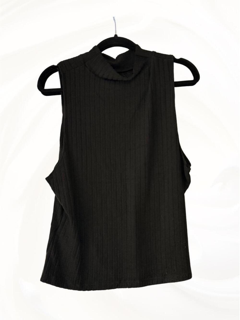 Black sleeveless mockneck sweater